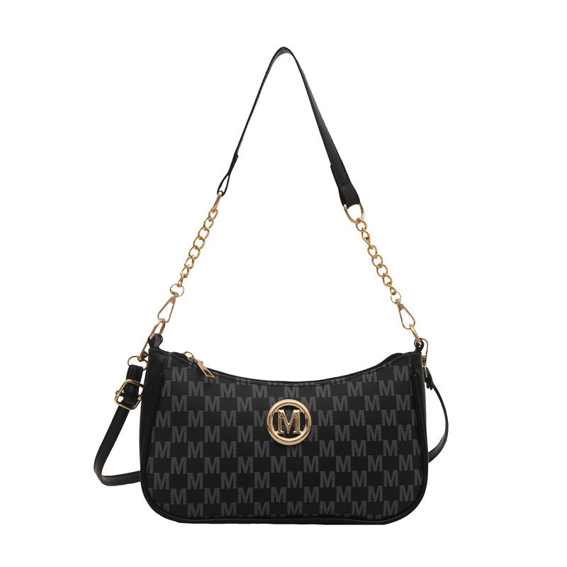 Women’s black monogram shoulder pouch bag with gold chain and side strap