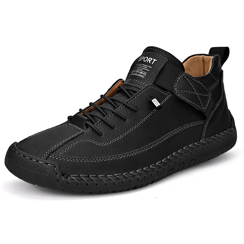 Men's mid-top leather lace-up shoe in black with padded collar and textured rubber outsole.