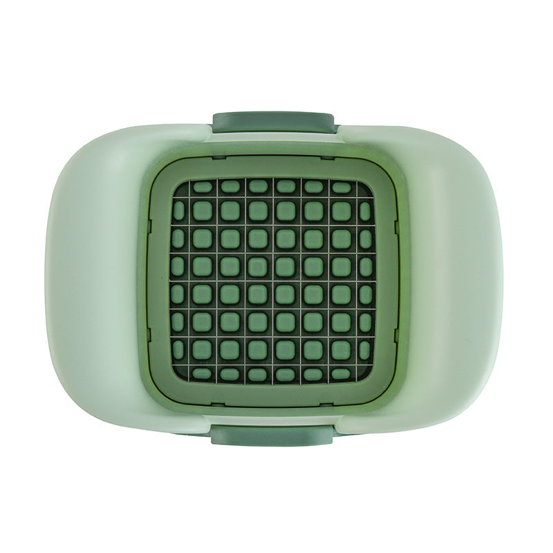 Green pet carrier with grid pattern on a white background