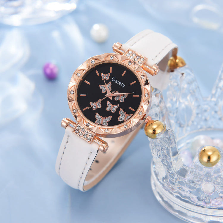 Women’s butterfly quartz watch with black dial and white leather strap