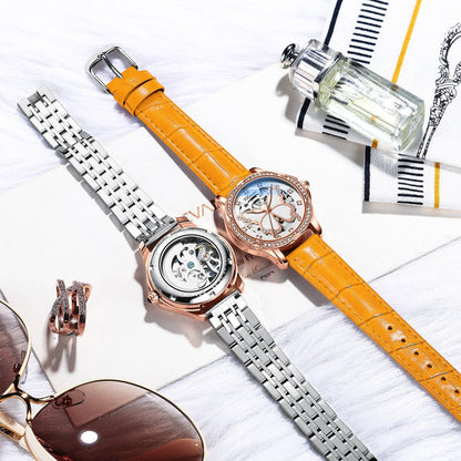 Set of two women’s watches: orange leather & silver metal bracelets, jeweled butterfly dials
