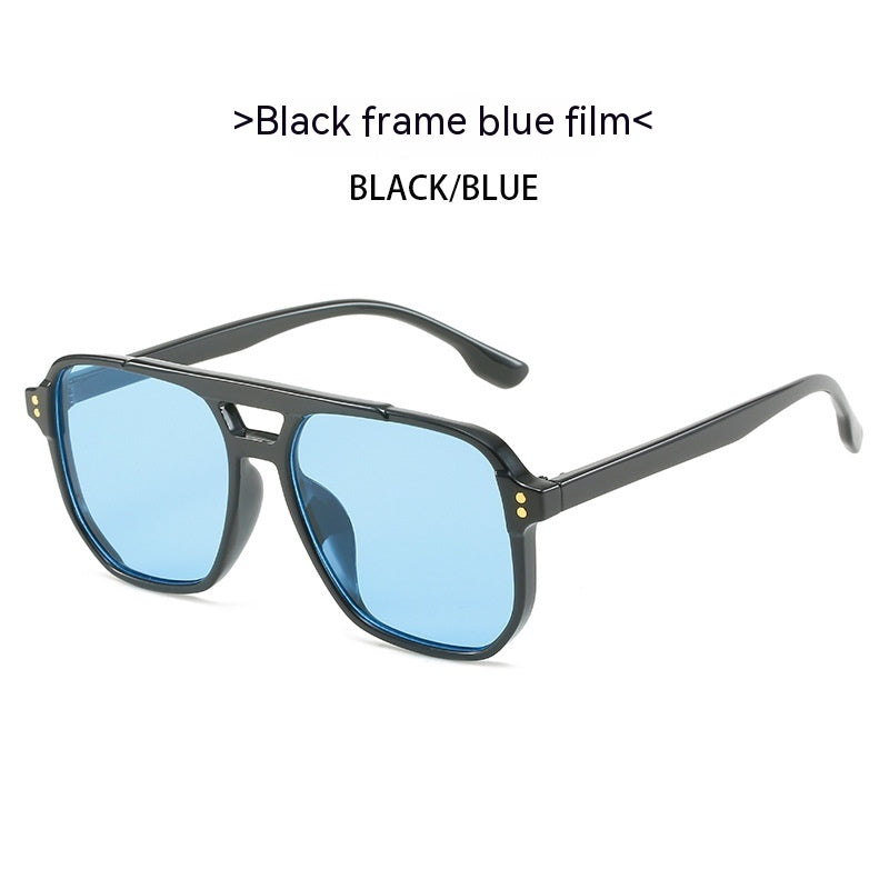 Sunglasses with black frame and blue lenses on a white background