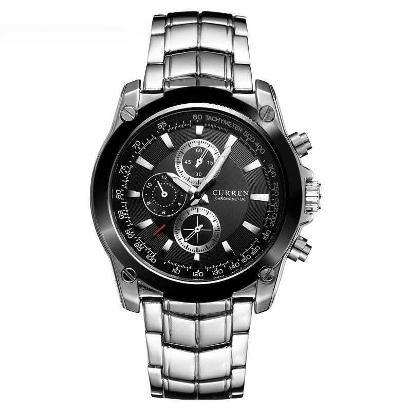 Silver wristwatch with a black face on a white background