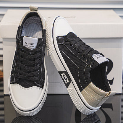 Black and white sneakers on a reflective surface with a blurred background