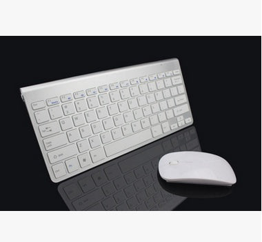 Wireless mini keyboard and mouse set with white keys and matching white mouse