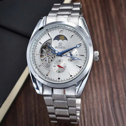 Men's mechanical hollow-dial watch, white face, blue hands, steel bracelet