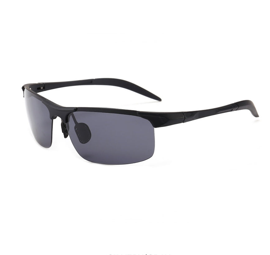 Black sunglasses with dark lenses on a white background