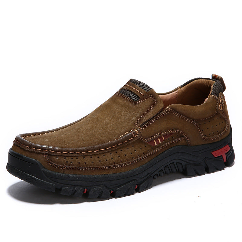 Brown leather shoe with black sole on a white background