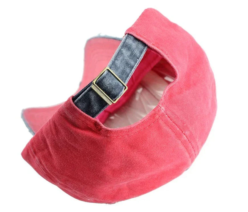 Women’s baseball cap in red-pink with adjustable back strap and metal buckle