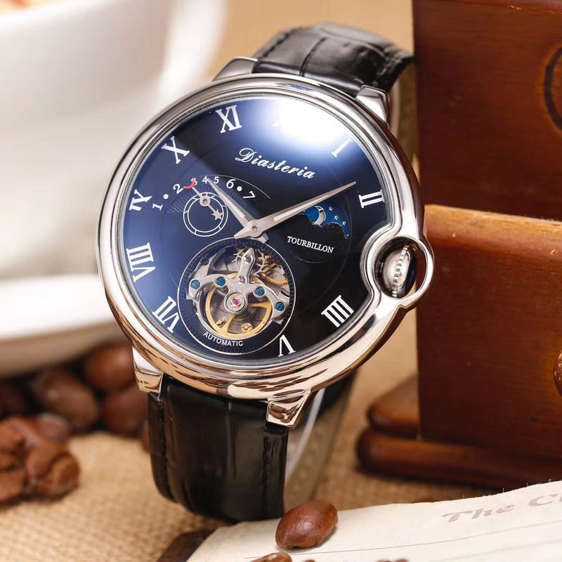 Mechanical tourbillon watch with dark blue dial, Roman numerals, black leather strap, silver case