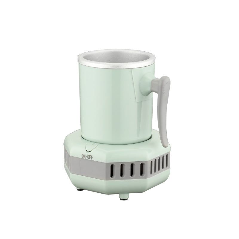 Mint green electric coffee grinder on a white background