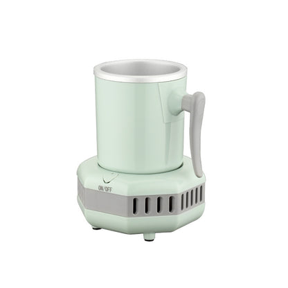 Mint green electric coffee grinder on a white background
