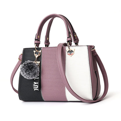 Multicolored handbag with a textured pattern on a white background