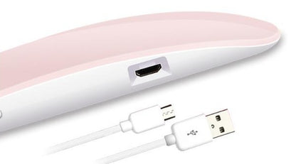 Pink Nail Drayer with USB cable on a white background