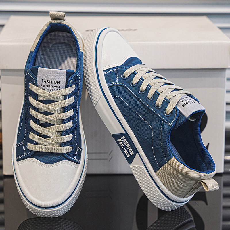 Blue and white sneakers with 'Fashion' label on a reflective surface