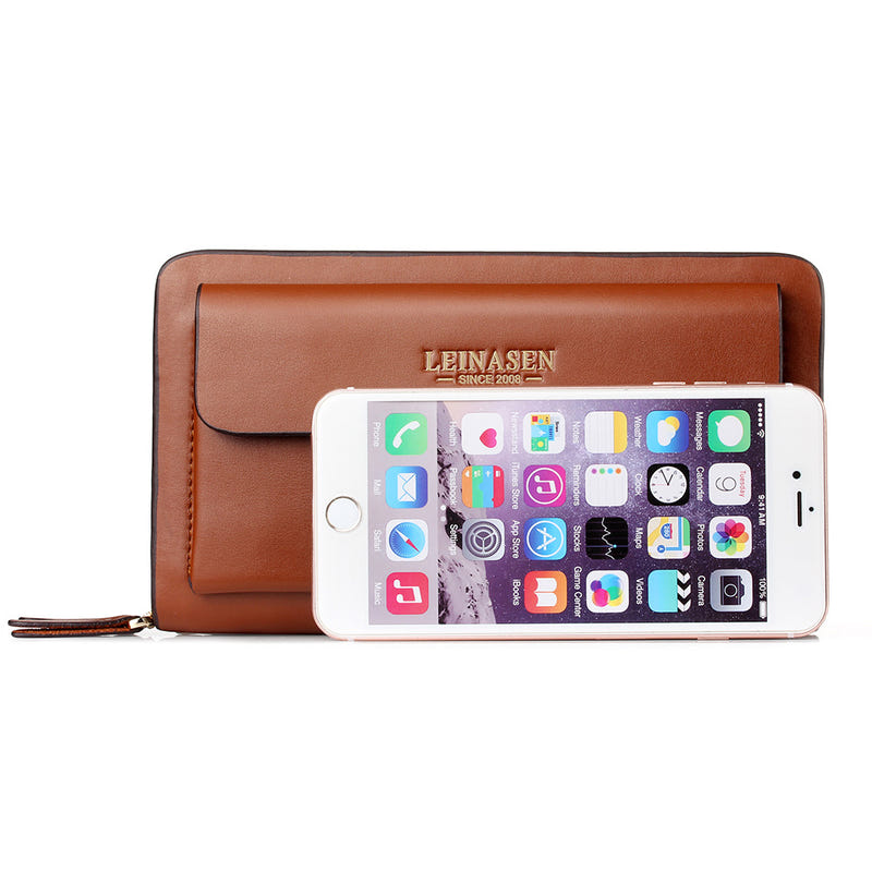 Brown leather mobile phone handbag with front flap and zipper, holds a smartphone