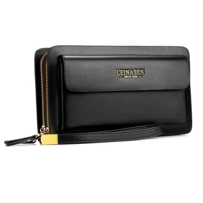 Black leather mobile phone handbag with front flap, gold zipper, and wrist strap