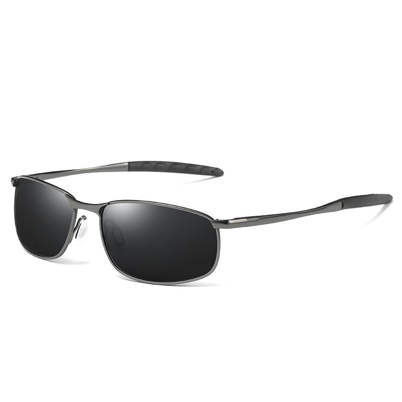 Sunglasses with black lenses and silver frame on a white background
