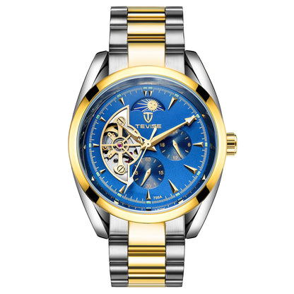 Two-tone mechanical tourbillon watch with blue dial, gold accents, and metal link bracelet