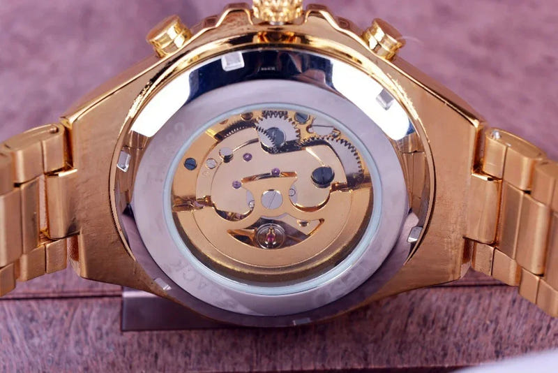 Rose-gold automatic mechanical steel watch with open-work dial and metal bracelet