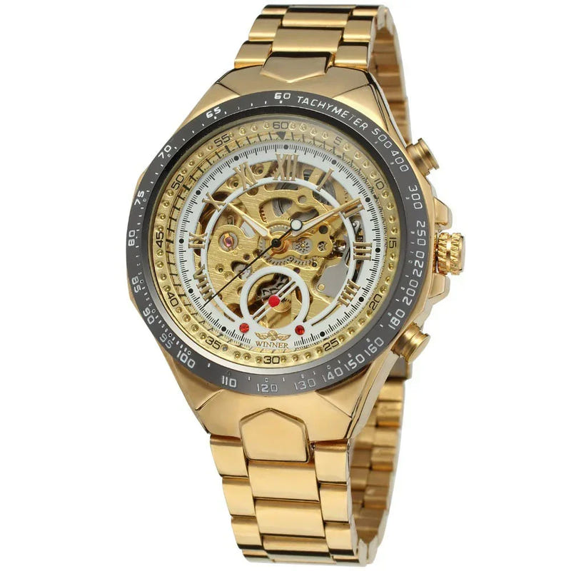 Gold automatic mechanical steel watch with skeleton dial and black tachymeter bezel, metal link band