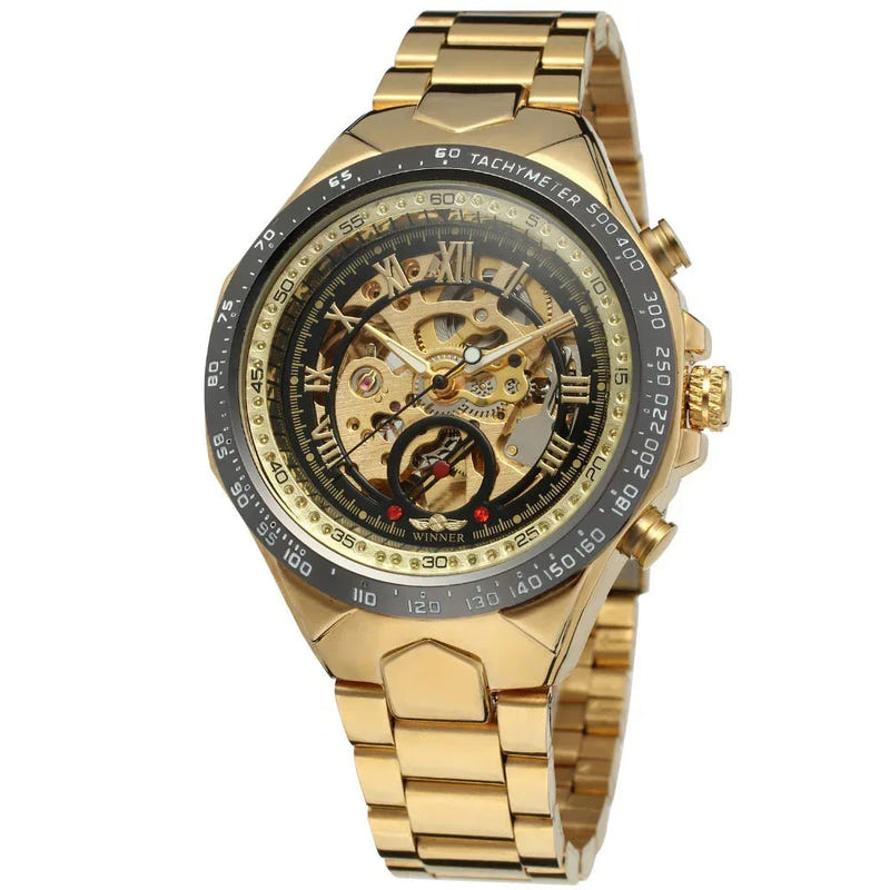 Gold automatic mechanical steel watch with skeleton dial and black tachymeter bezel, metal bracelet