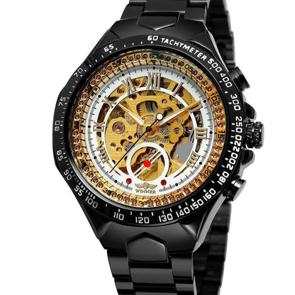 Black automatic mechanical steel watch with skeleton dial, gold bezel accents, metal bracelet