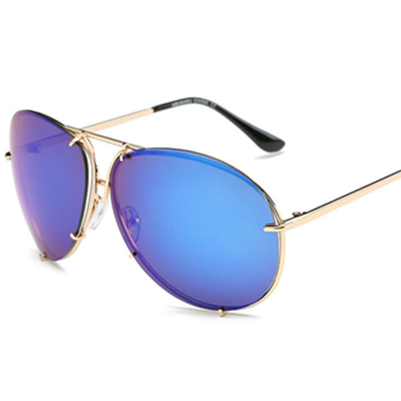 Sunglasses with blue lenses and gold frame on a white background