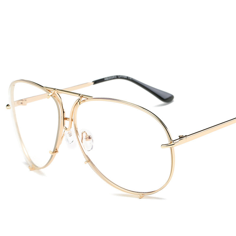 Gold-framed eyeglasses on a white background