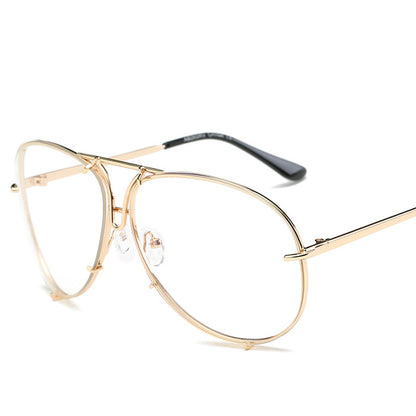 Gold-framed eyeglasses on a white background