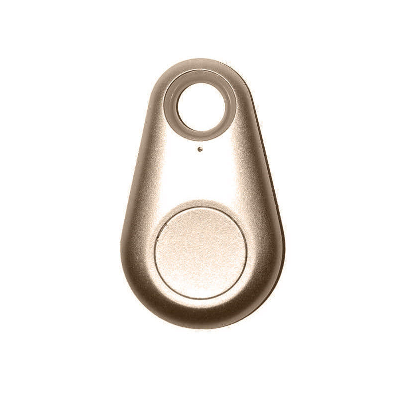 Gold-colored device shaped like a teardrop on a white background