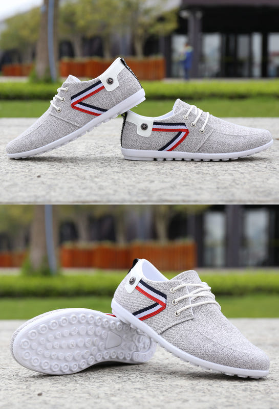 Grey canvas lace-up shoes with striped side panels and textured outsole