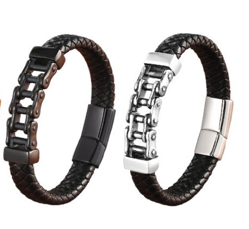 Two black leather bracelets with metal clasp on a white background