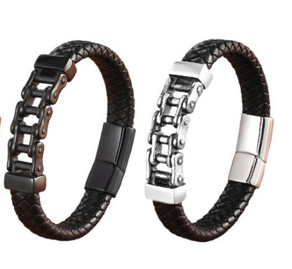 Two black leather bracelets with metal clasp on a white background