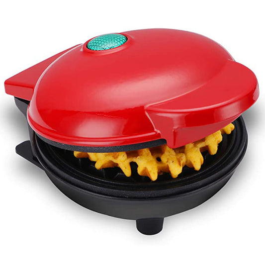 Red waffle maker with waffles on a white background