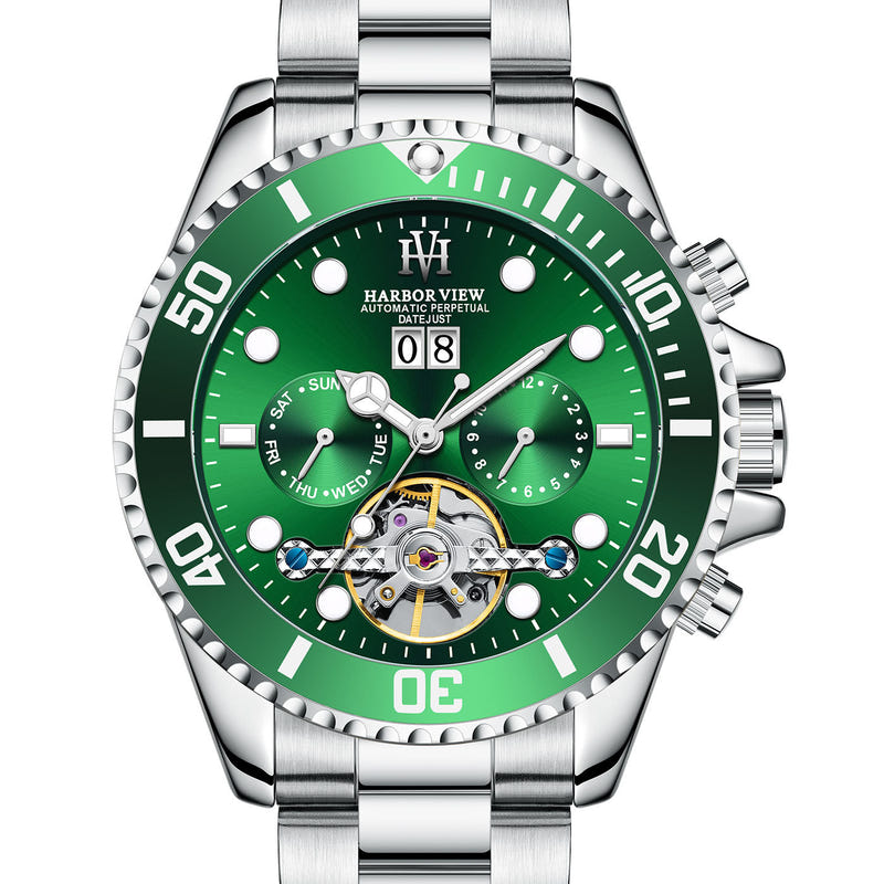 Men's tourbillon automatic watch with green dial, gold hour markers, and silver bracelet