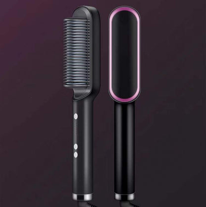 Black hair straightening brush with pink accents on a dark purple background