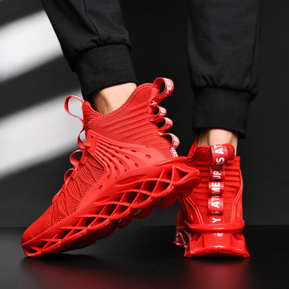 Red high-top sneakers with a unique sole design worn by a person in black pants.