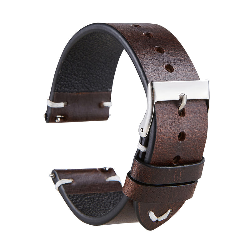 Thin brown leather watch strap with silver buckle and adjustment holes