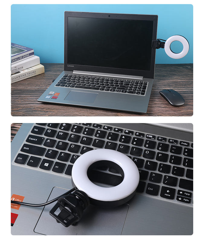 Round LED selfie light ring on laptop keyboard with USB cable