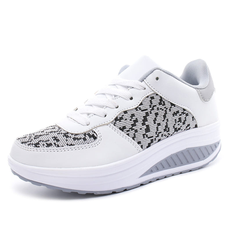 Women's white woven sport shoes with black-gray knit detail, lace-up and white sole
