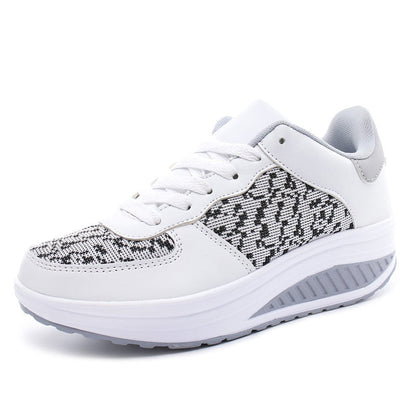 Women's white woven sport shoes with black-gray knit detail, lace-up and white sole