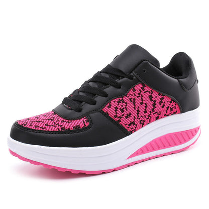 Women's black and pink woven sport shoes, lace-up with bold pink upper and white sole