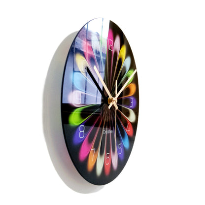 Colorful wall clock with a white frame on a white background
