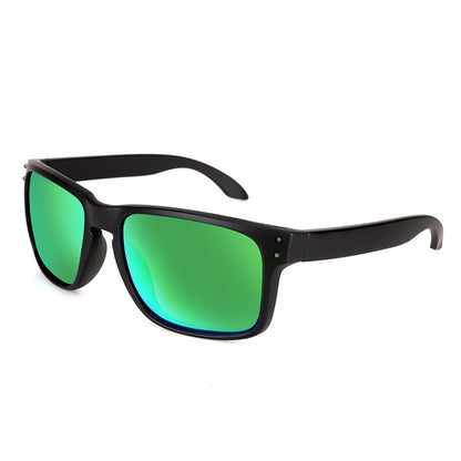 Black sunglasses with green lenses on a white background