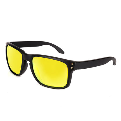 Sunglasses with black frame and yellow lenses on a white background