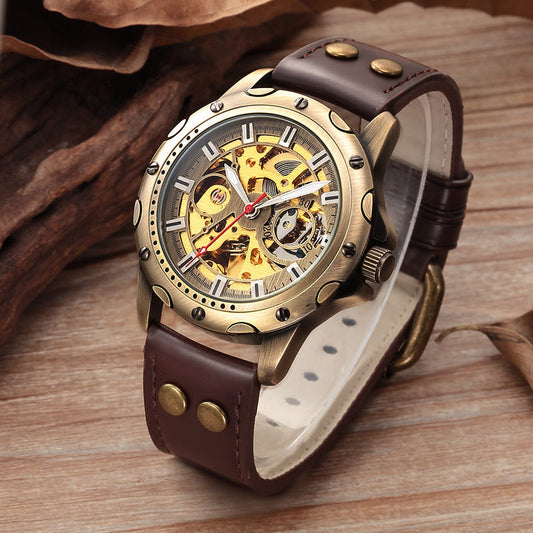 Bronze mechanical skeleton watch with brown leather strap and ornate dial