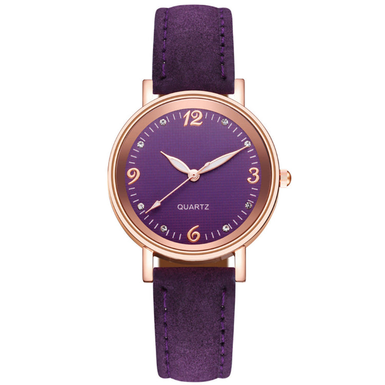 Purple watch with rose gold case and strap on a white background