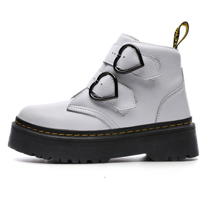 White boot with heart-shaped buckles on a white background