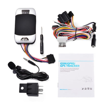 GSM/GPS tracker with wiring harness, microphone, and packaging on a white background